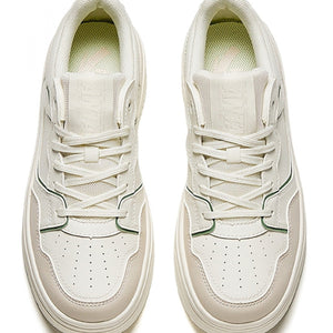 White sneakers with a light sole on a white background