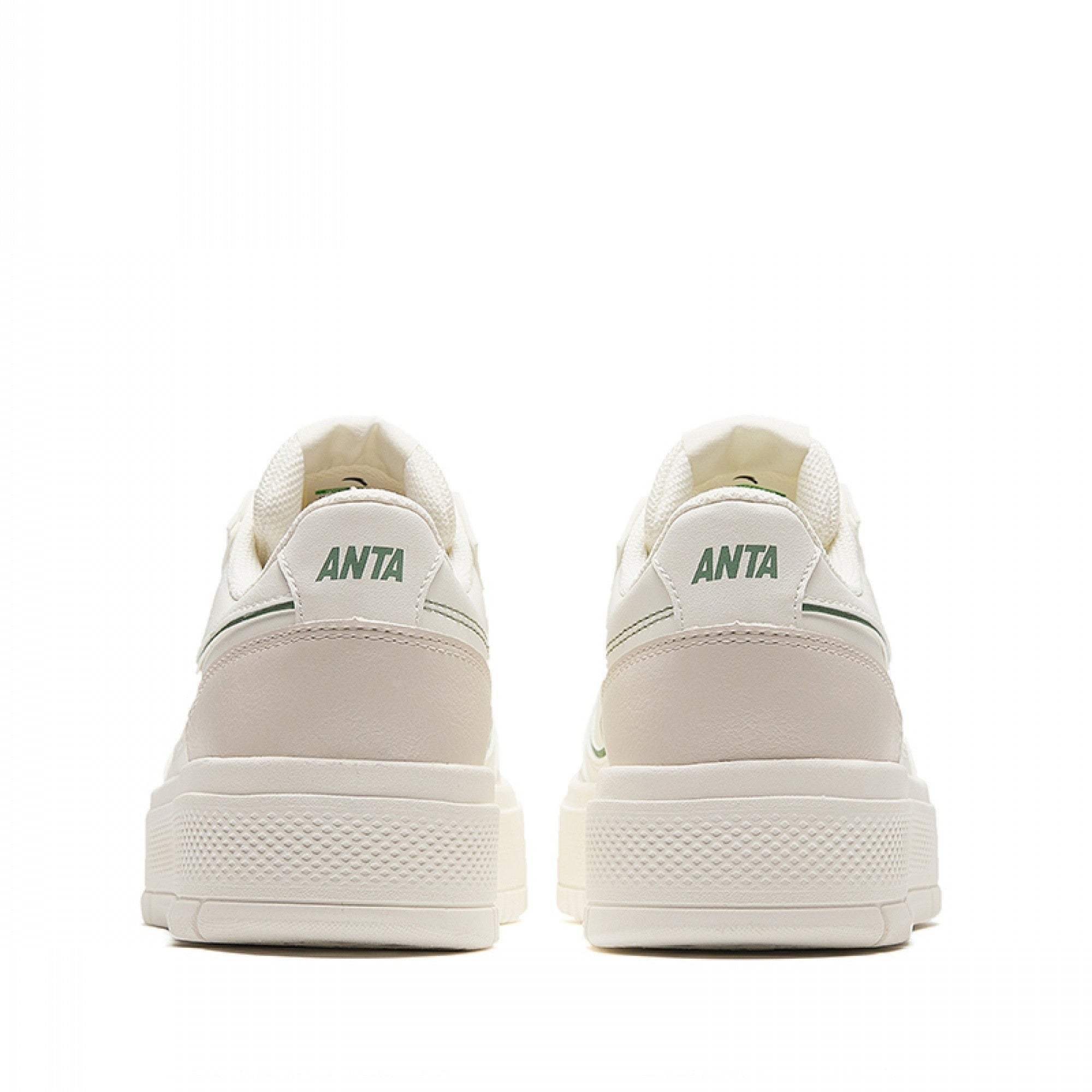 Pair of beige sneakers with 'ANTA' branding on a white background